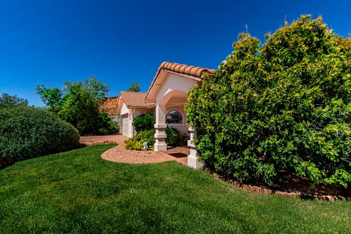 158 Pinon Woods - Side view looking to Castle Rock - - Call Sheri Sperry @ 928.274.7355 for all your Sedona real estate needs