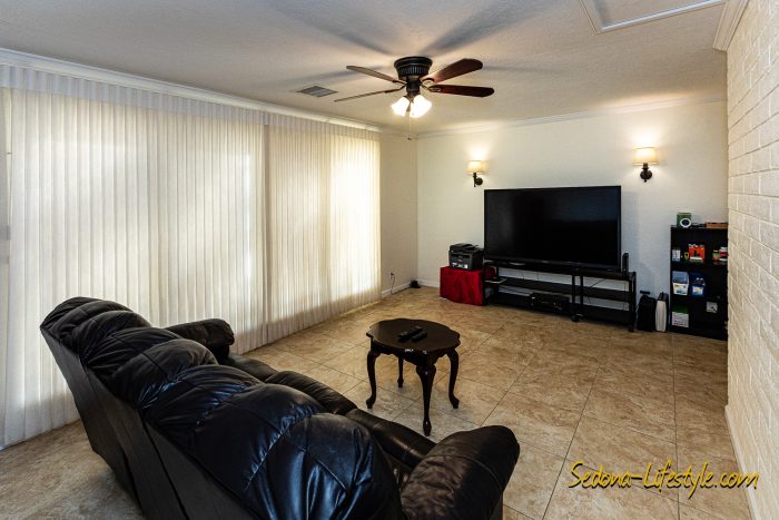 Family or media room with sliders to courtyard - Call Sheri Sperry @ 928.274.7355 for all your real estate needs.