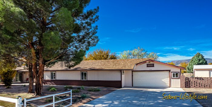Concrete driveway to attached garage - - Call Sheri Sperry @ 928.274.7355 for all your real estate needs.