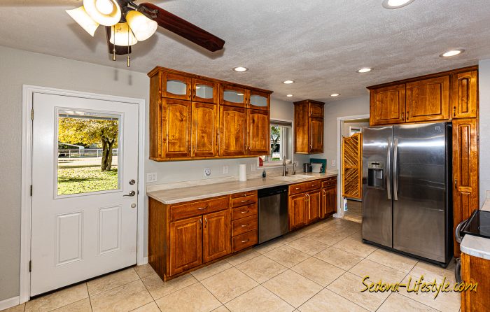 Kitchen - with storage and counter space and door to back yard - Call Sheri Sperry @ 928.274.7355 for all your real estate needs.