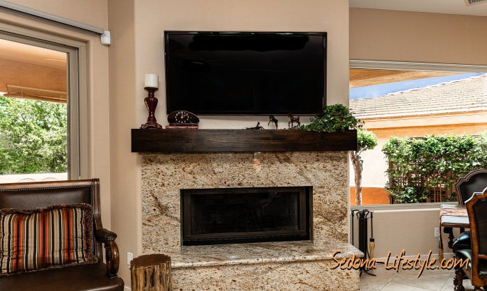 Custom Mantel and fireplace with electric fire feature.